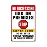No tresspassing dog on premises stop keep gate shut do not enter without permission or owner present yard sign in Rwanda